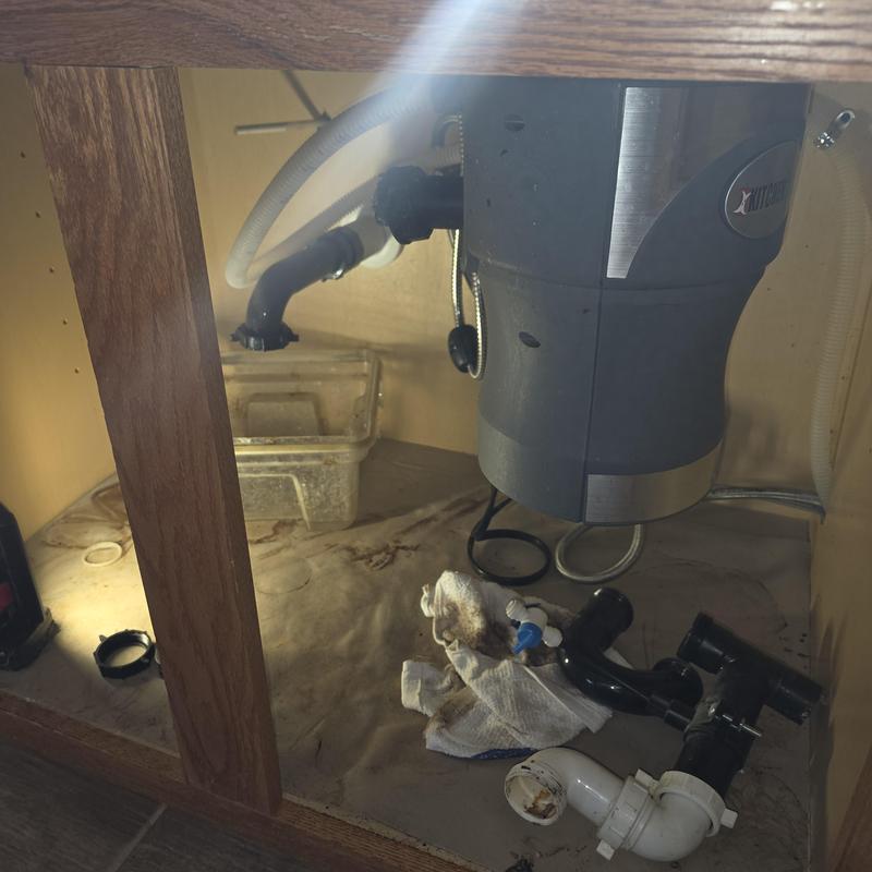 Garbage disposal and P-trap replacement under sink