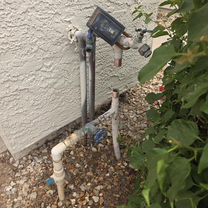 Water service gate valves and outdoor spigot setup