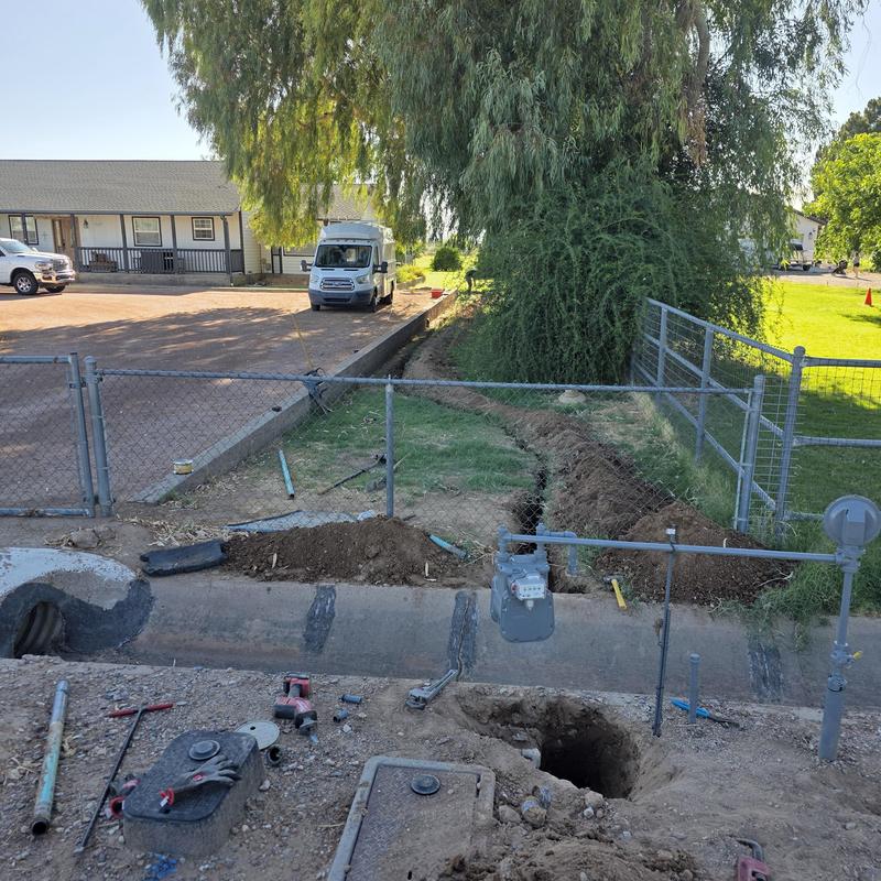 Polyethylene gas line trench and meter installation