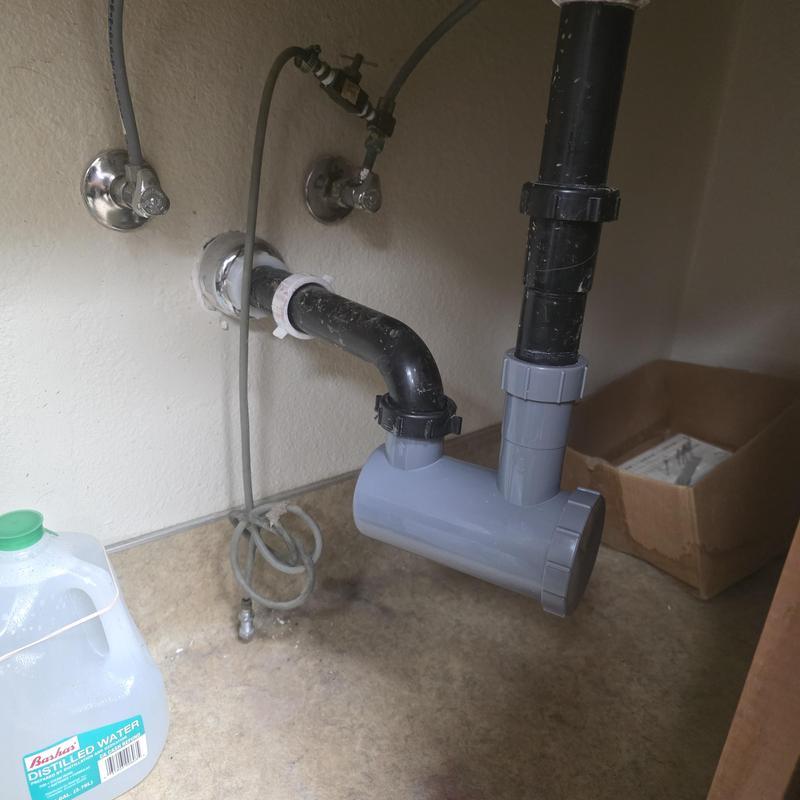 Hair trap installation on veterinary office sink drain
