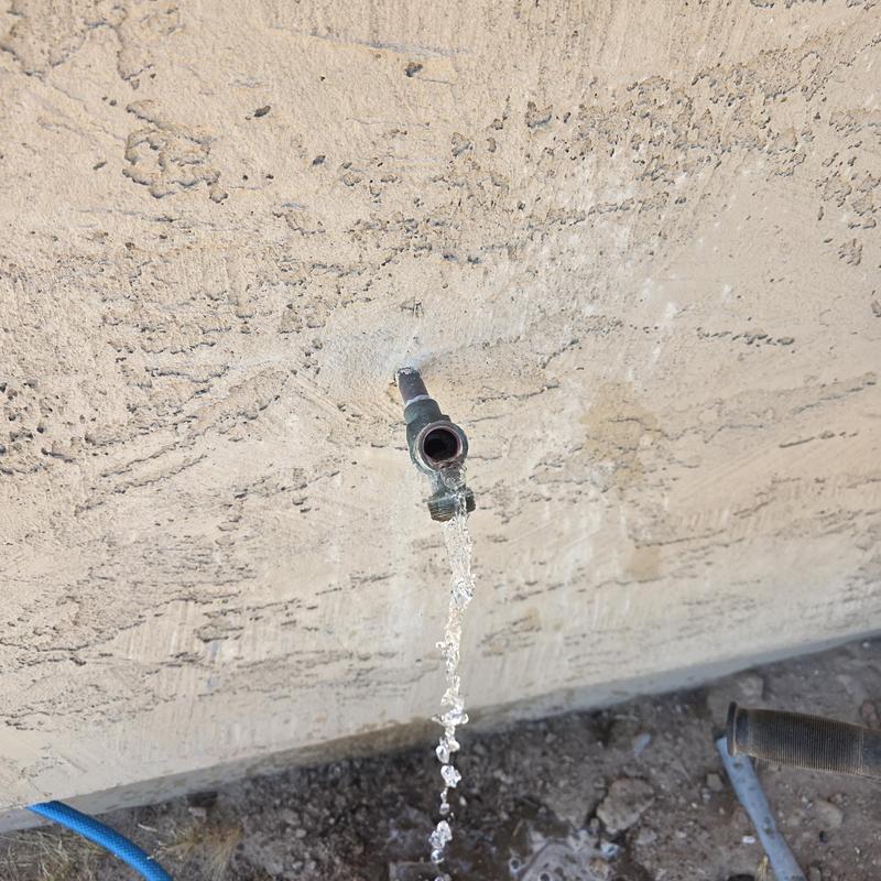 Backyard hose bib leaking water from pipe connection