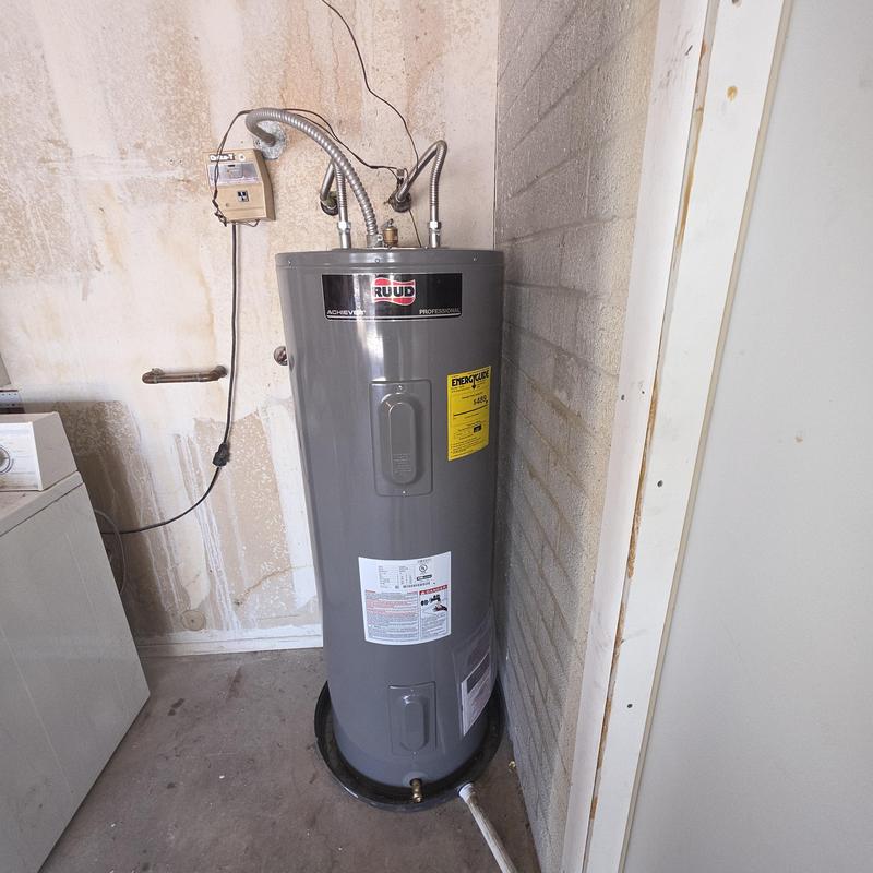 50 gallon electric water heater installation in utility room