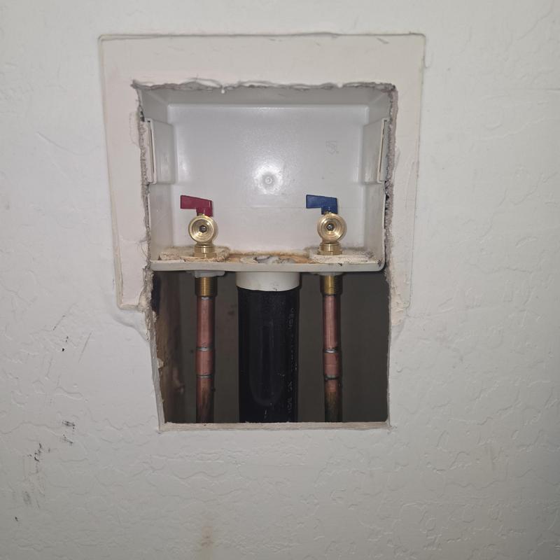 Washer box valves installation in drywall cutout