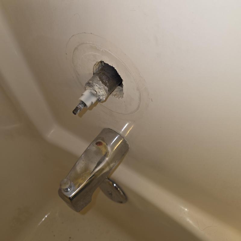 Mixit tub cartridge exposed for replacement in tub