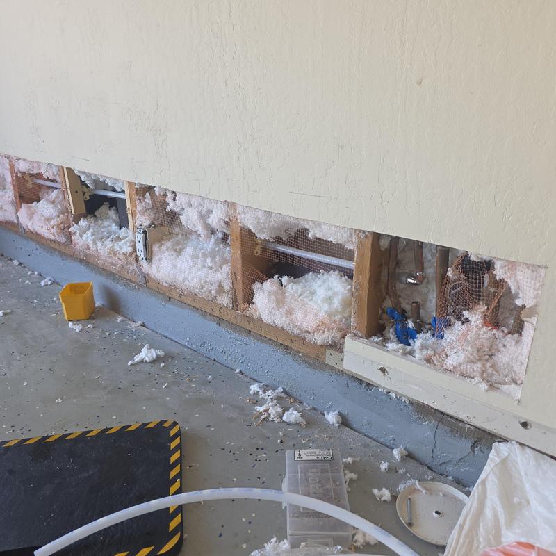 Cold water pipe reroute in wall slab leak repair