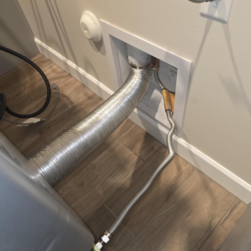 Gas line and vent hose connection to dryer