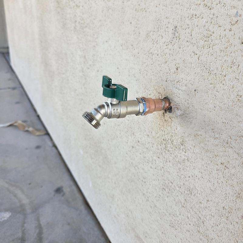 Hose bib replacement with new valve on exterior wall