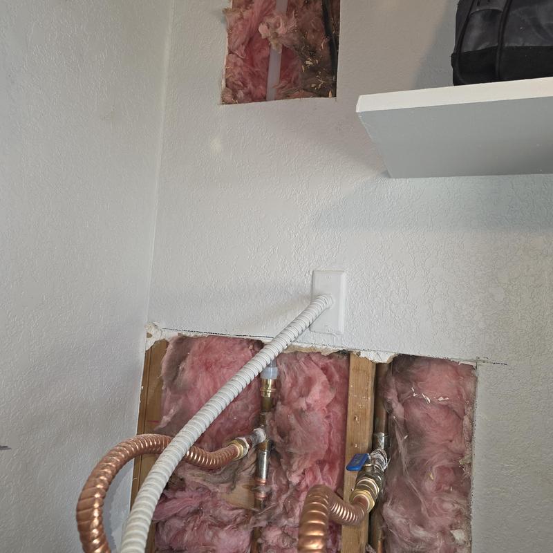 PEX piping reroute for hot water slab leak repair